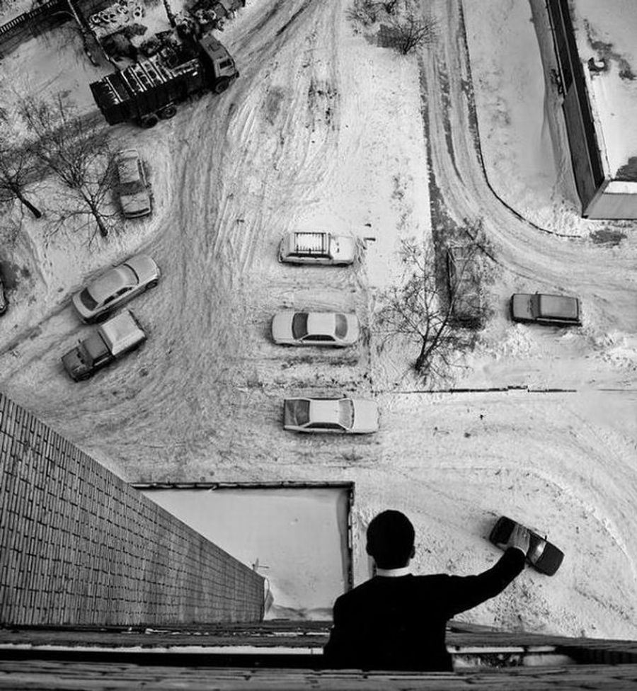 Man playing with cars